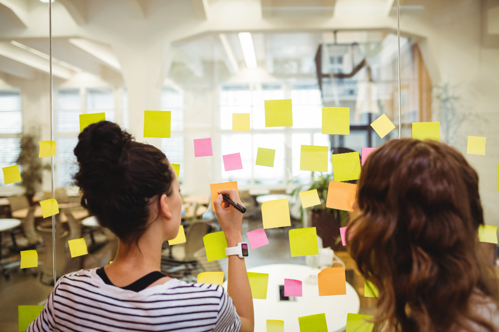 Hive Micro Review 2024: Legit or Scam? 4 Why LinkedIn Connection Troubles Arise business executives writing sticky notes