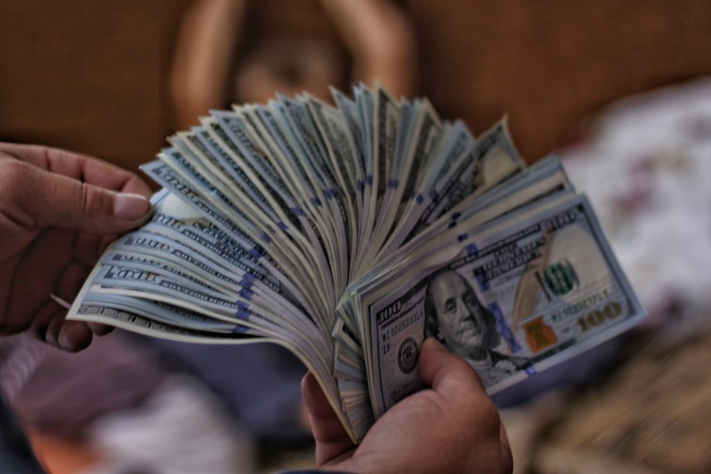 Project PayDay.com Review – Scam or Not! 2024 Ultimate Breakdown 3 Project PayDay.com Review 100 US dollar banknotes