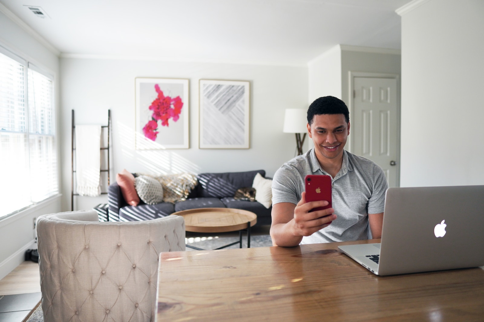 SurveyWorld Review: 7 Compelling Reasons Why It's a Game-Changer in Online Surveys 2 man in gray crew neck t-shirt holding red iphone case