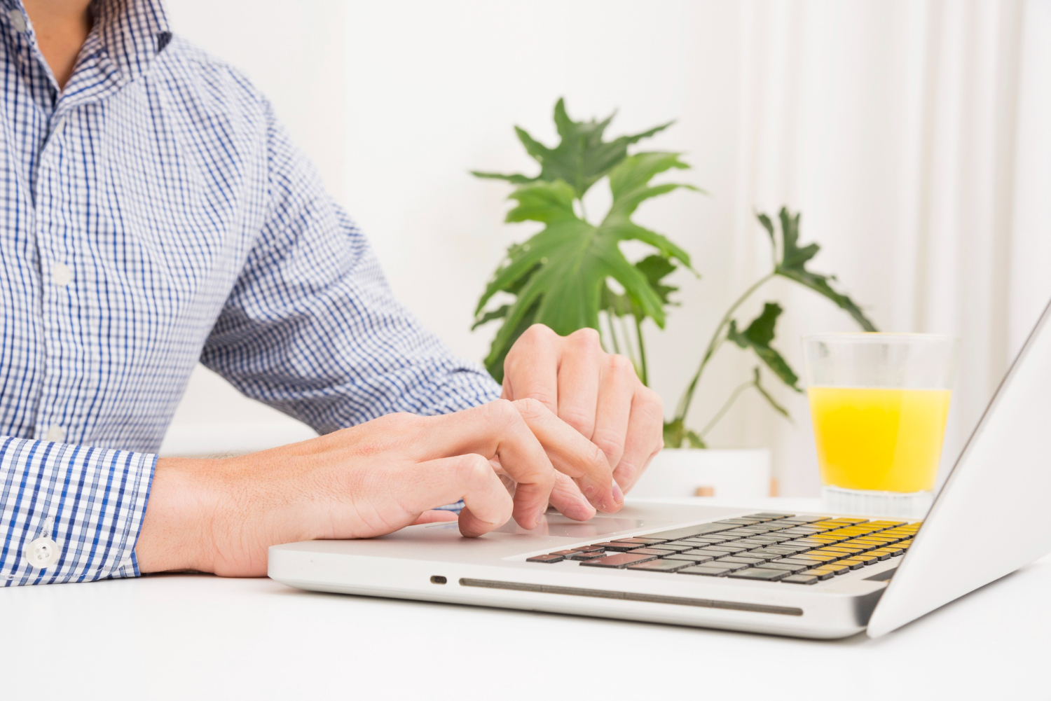 businessman using laptop breakfast time table