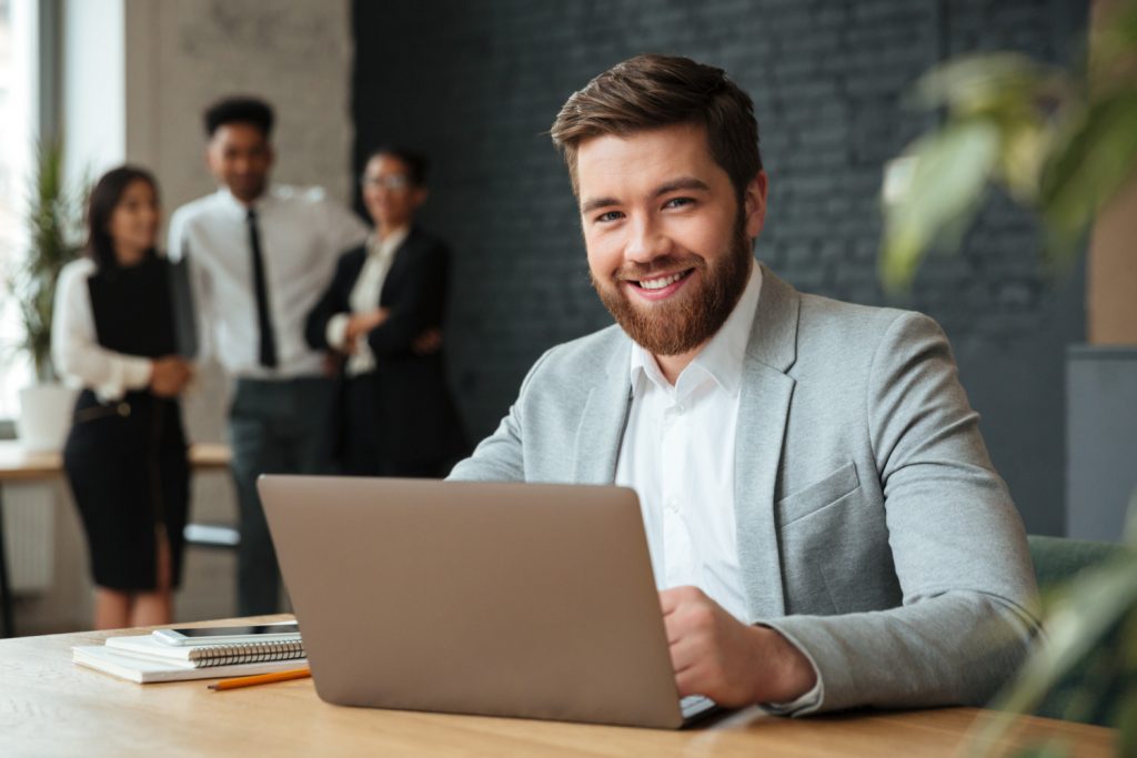 cheerful young caucasian businessman