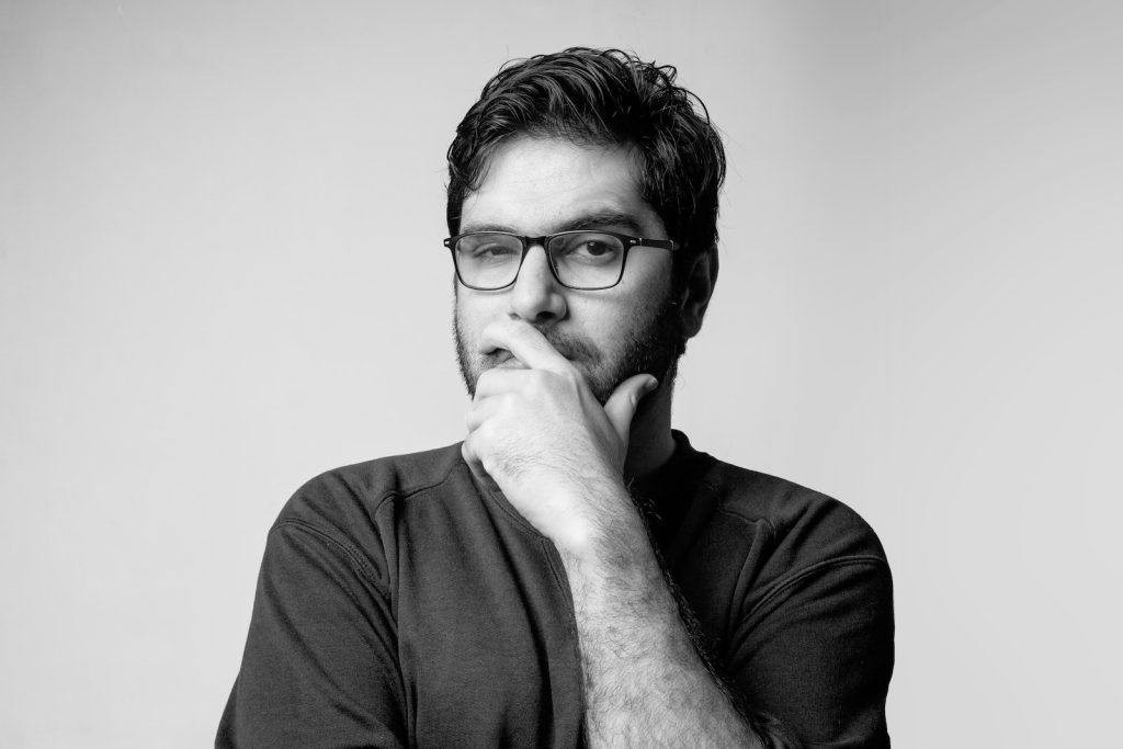 Qriket Review: A Deep Dive into its Legitimacy 2 Qriket Review man in black long sleeve shirt wearing black framed eyeglasses