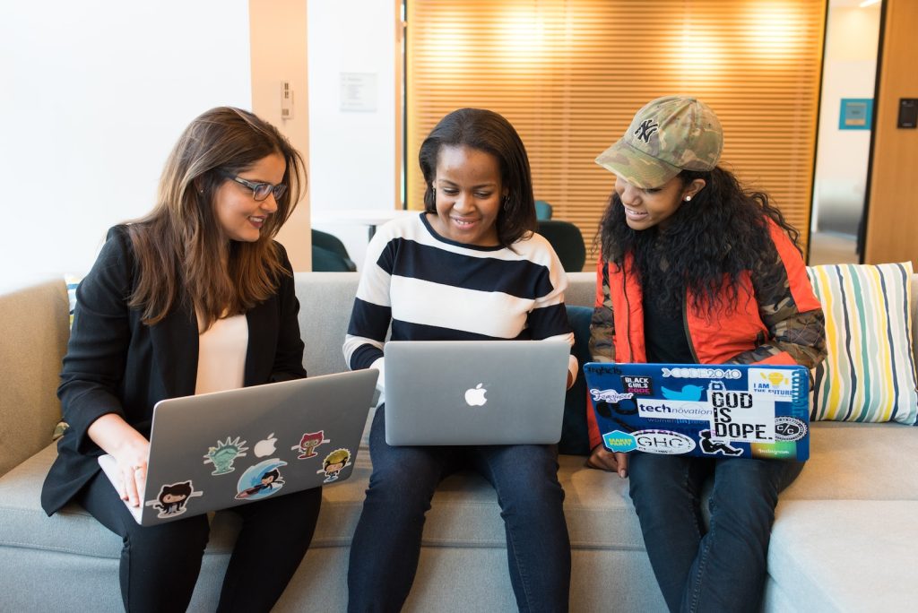 LinkedIn InMail three women sitting on sofa with MacBook