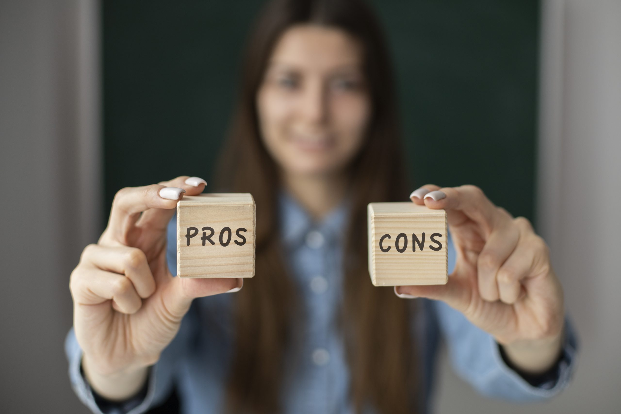 medium shot blurry woman holding cubes