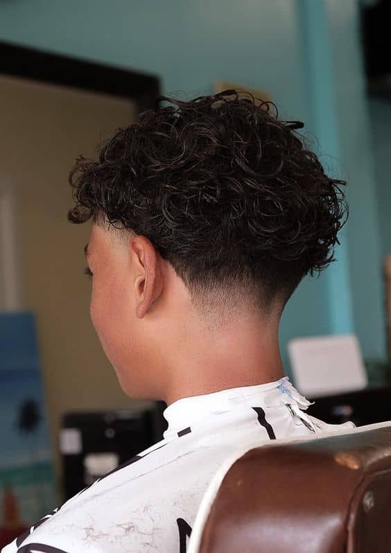 Textured Curls with Mid Taper Fade